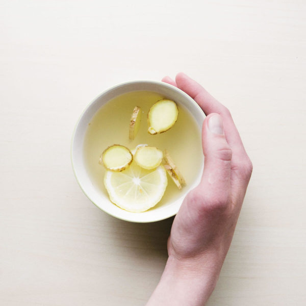 cup of hot water with lemon