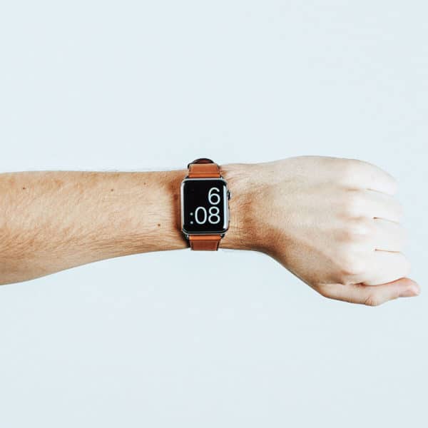 a digital watch on someone's wrist