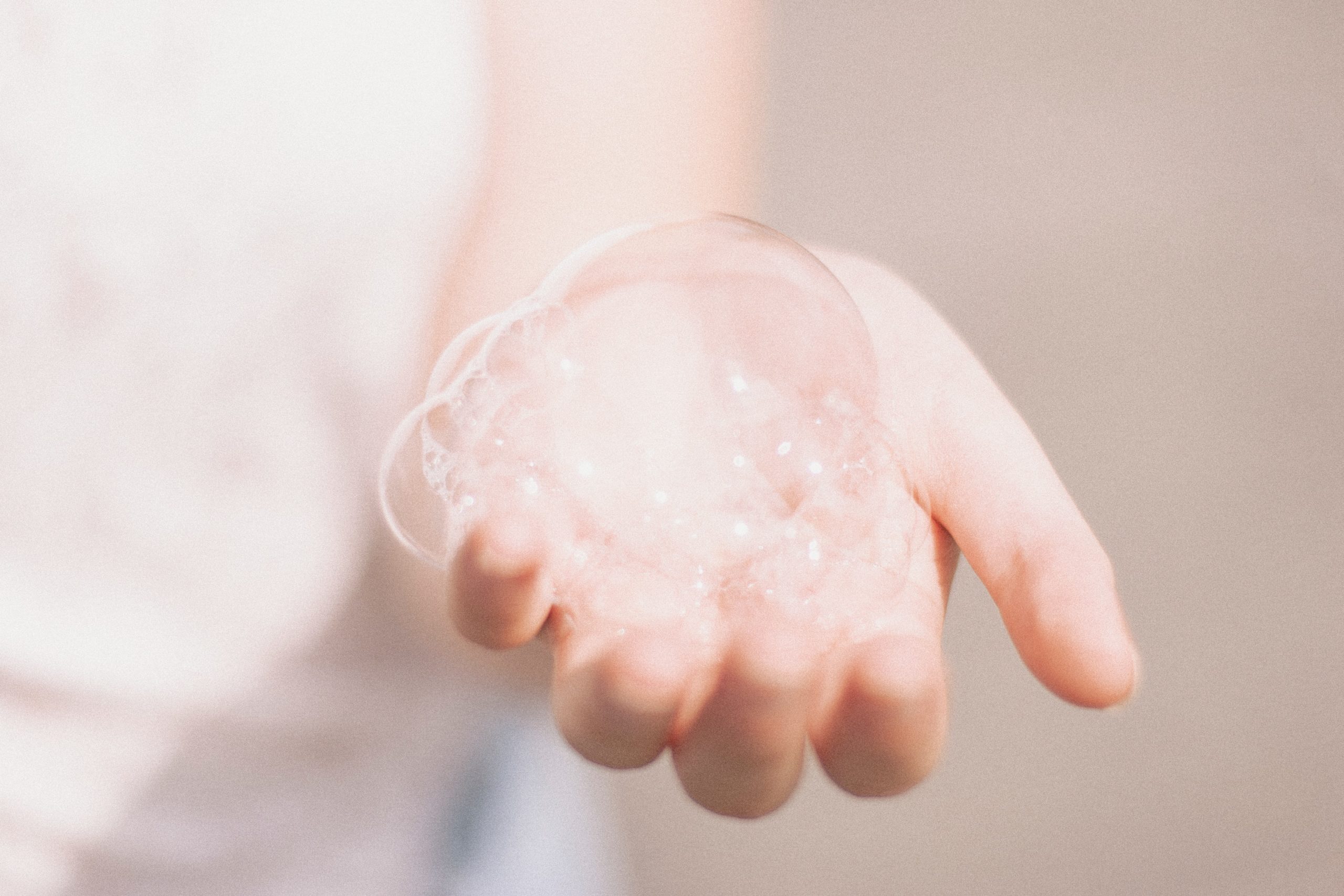 hand with a soap bubble on it