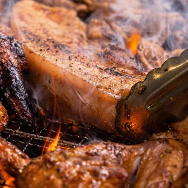 close up of meat on the grill