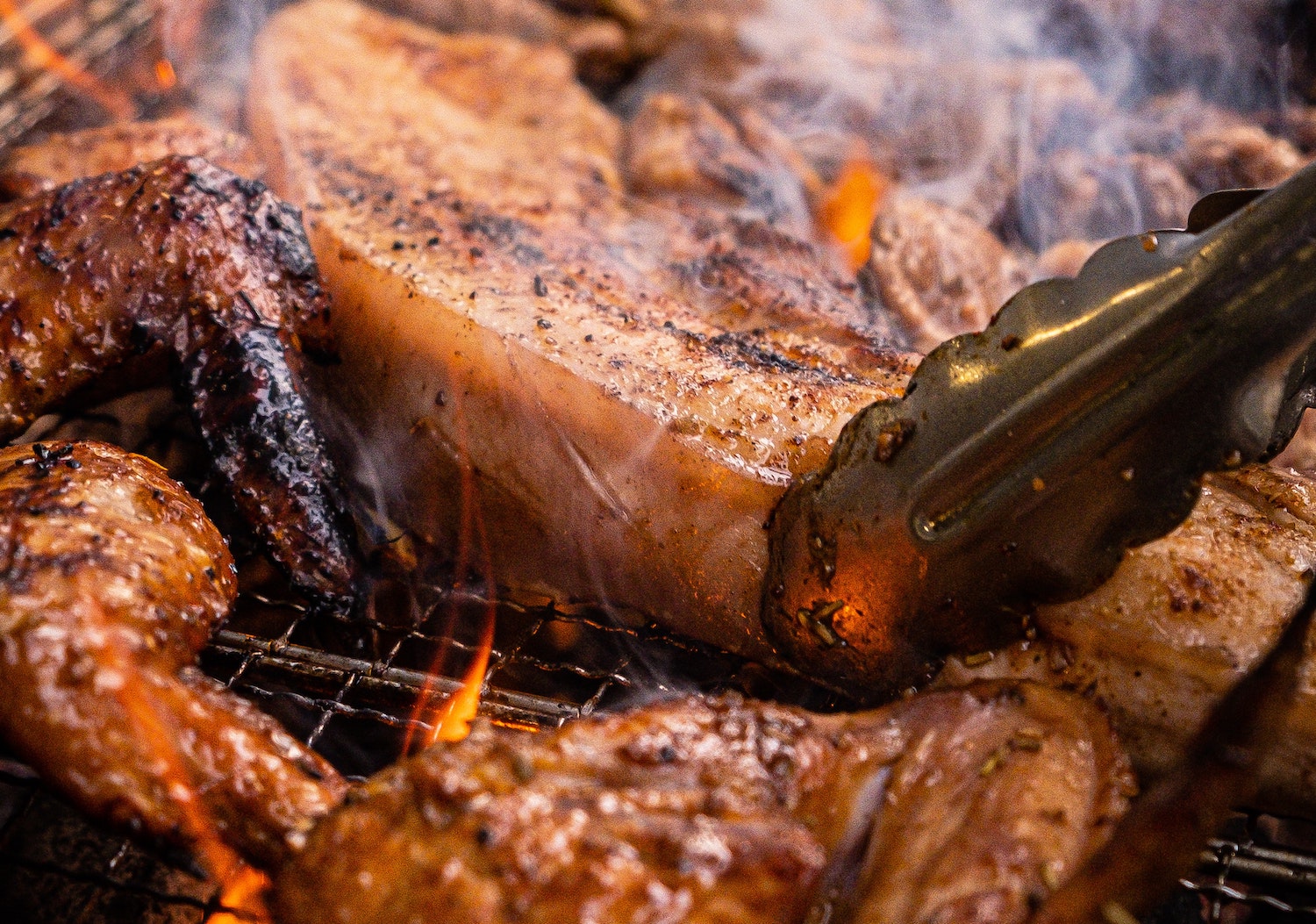 close up of meat on the grill