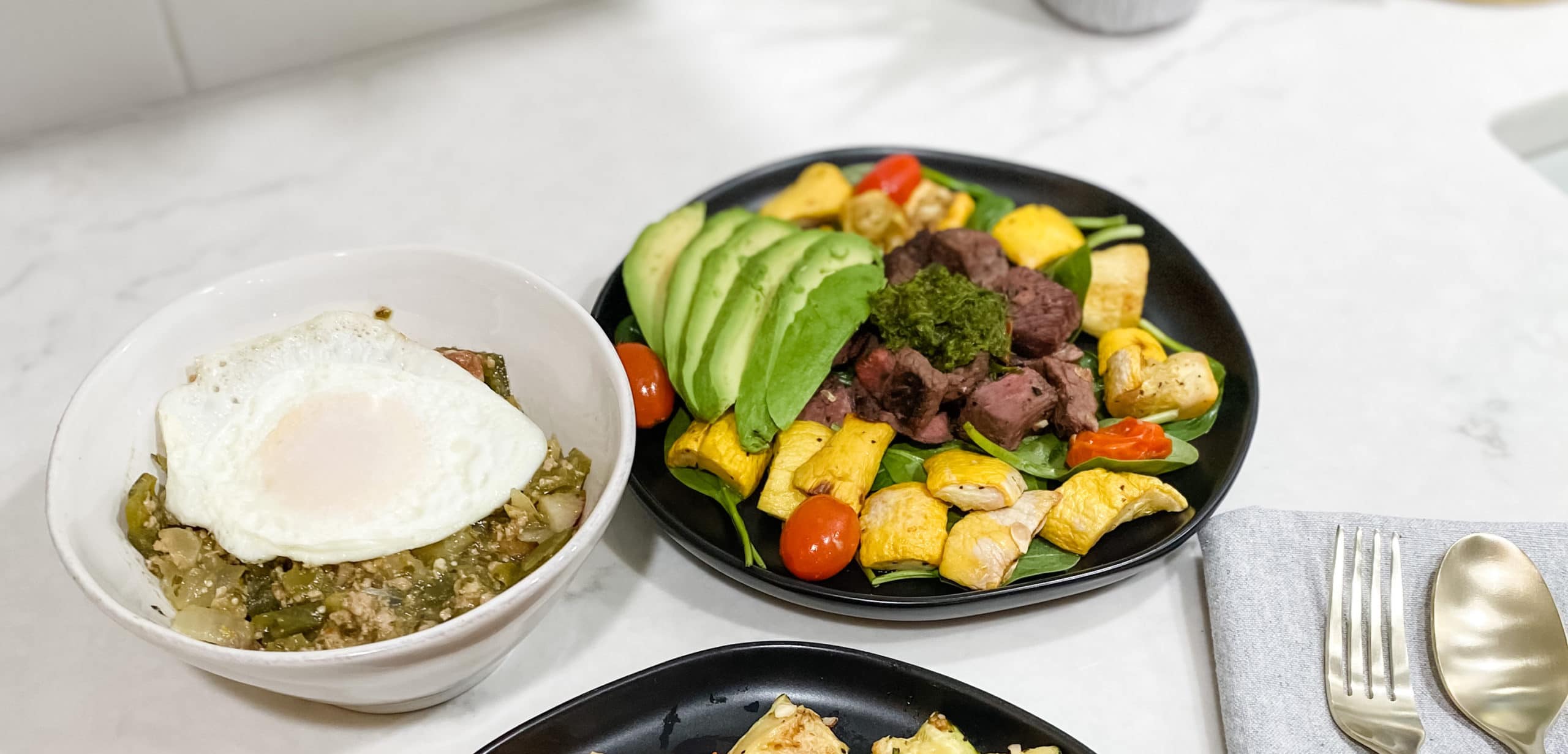 Chimichurri beef on a black plate