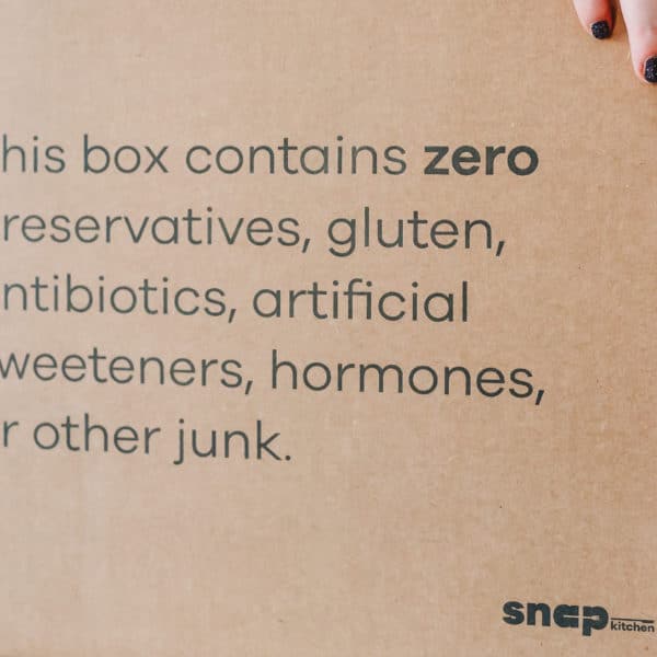 Snap Kitchen shipping box printed with the words 