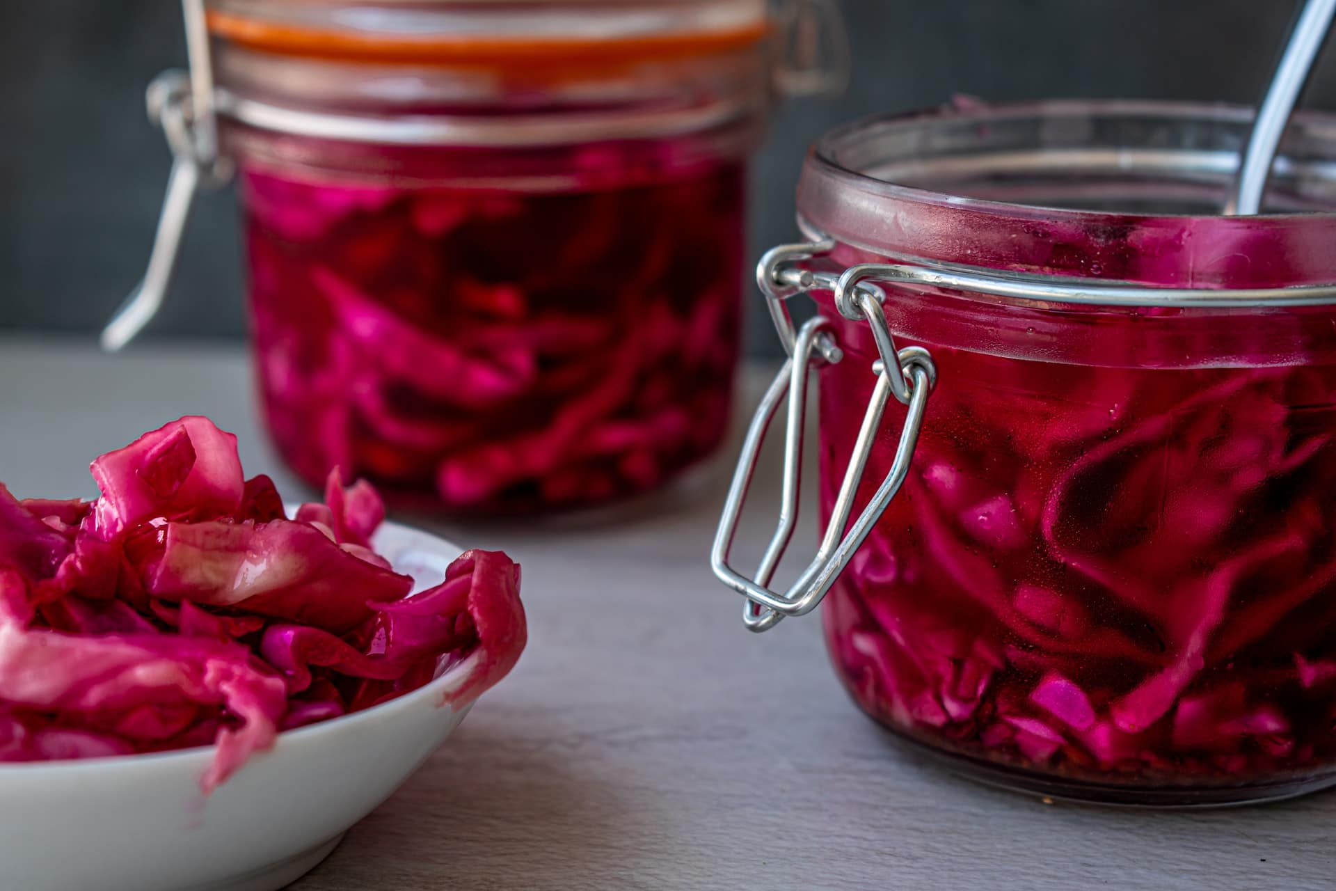 Glass jars of pickled red cabbage