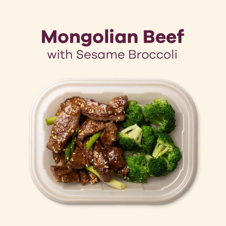 mongolian beef with sesame broccoli on a white plate